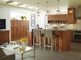 They have a full line of specialty glass doors and hardware choices. Kemper Echo Cabinets In The Loretto Door Style Maple With Sandstone Stain The Warm Wood Tone Perfectly Compliments The Greige Warm Wood Furniture Home Decor