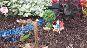 Some New Neighbors Moved Into My Fantasy Garden Fantasy Garden Miniature Fairy Miniature Outdoors Gardenart Fairy Garden Garden Art Garden Plants