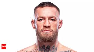 UFC legend Conor McGregor's beach kiss with mystery woman triggers bold  response from Dee Devlin