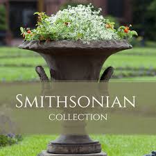 An outdoor planter with high visual appeal, the arabesque square planter has a classic pattern of intertwining lines to form a beautiful design. Outdoor Accents Collections Kinsey Garden Decor