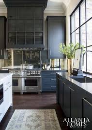 43 dramatic black kitchens that make a