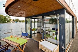 Using a clever support system, the coffee mug floats in the. Sail Away From It All In The Gorgeous Nautlius Houseboat