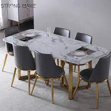 Measuring 75cm in height, the table has a standard height and a sizeable surface measuring 70cm in. Italian White Marble Dining Table Nordic Rectangular Mesa Marmol Stainless Steel Legs 4 Seater Light Luxury Dining Table Buy Modern Marble Top Dining Table 4 Seater Dining Table Luxury Dining Table Set Product