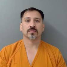 A raid by Laredo authorities discovered firearms, narcotics, $24.6K