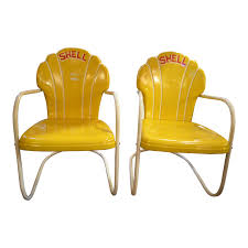 Vintage lawn chair retro 1970s mid century modern + warm rainbow colors + webbed vinyl seat + white metal frame + folds up + patio chair. Calumet Yellow Shell Chairs Pair Metal Outdoor Chairs Shell Chair Metal Chairs