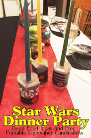 Using a selection of the paper masks, attach them to these giant inflatable skittles then let the jedi see how many baddies they can bowl over. Diy Party Mom Star Wars Family Dinner Party Printable Lightsaber Candles