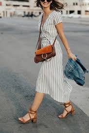 7 Tips For Wearing A Wrap Dress All Summer Long Fashion Street Style Dress Clothes