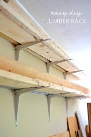White ceiling storage unit provides organization for your garage, basement, or attic, freeing up valuable floor space. Cheap And Easy Diy Lumber Rack Ugly Duckling House