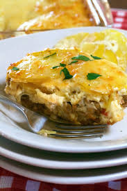 Combine grated cheese with breadcrumbs and sprinkle on top. Scalloped Meatloaf Casserole What The Forks For Dinner