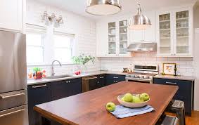 Creating two color tones in one kitchen cabinet set is a great way to create impact. Blue And White Two Toned Kitchen Farmhouse Kitchen Austin By Paper Moon Painting Houzz