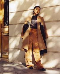 1 selecting a style of camel coat. The Dawn Camel Hair Coat Alysee Yin Chen