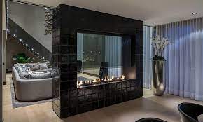 The slightly tinted glass runs around the entire enclosure and all the way to the ceiling. Pros And Cons Of Double Sided Fireplace Modus Fireplaces