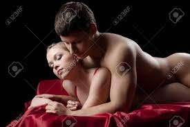 Young Strong Man Having Sex With Beauty Girl On Red Sheet Stock Photo,  Picture and Royalty Free Image. Image 16890749.