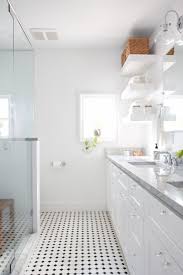 In this bath, a custom blend of clear glass tile, opaque glass tile, and carrara marble tile brings shades of white. Bathroom Tile Ideas Floor Shower Wall Designs Apartment Therapy