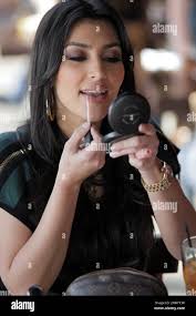 Kim Kardashian and sisters Khloe and Kourtney enjoy a meal at Toast. After  eating, the girls touch up their makeup before heading to the Hillary Rush  boutique for a bit of shopping.