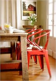 Crafted with oak wood in a light cappuccino finish, this simple table is accented by six solid dining chairs that are upholstered with supple red faux leather upholstery. Love The Pop Of Coral Red Color Chairs In This Urban Cottage Chic Kitchen Dining Area Farm Farmhouse Chic Dining Table Cottage Chic Kitchen Red Dining Chairs