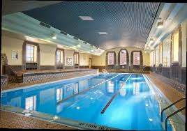 Swimming pool tiles are an elegant and affordable way to apply your personal touch to a pool. The Pool Within The Canal Park Ymca With Its Beautiful Mosaic Tile Work Pool Ymca Swimming Pools