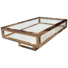 Check out our coffee & end tables selection for the very best in unique or custom, handmade pieces from our shops. 1970s Showcase Coffee Table In Brass And Chrome For Sale At 1stdibs