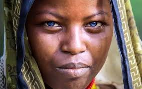 The cloth is usually blue or purple and the women adorn themselves further by applying ochre to their bodies in. Can A Black Person Have Blonde Hair And Blue Eyes And Still Be Black Quora