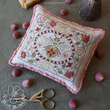 It's never too early to start making your homemade gifts for the holidays. The Blue Flower Tudor Bee Cross Stitch Pattern 123stitch