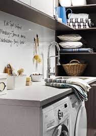 Laundry With Dry Erase Backsplash Made Of Magnetic Whiteboard Laminate From Formicagroup Magnetic White Board White Board Laundry Room Design