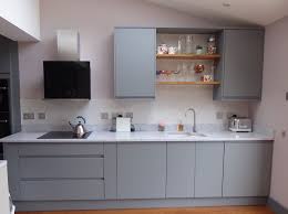 With a solid timber frame, painted finish, and authentic woodgrain detail, these doors are a great way to introduce a handmade feel to a space. Grey Kitchen Howdens Super Matt Grey Clerkenwell Range Quartz Worktops Open Shelving Modern Grey Kitchen Howdens Kitchens Kitchen Decor Modern