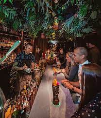 Three Dots And A Dash A Speakeasy Tiki Bar In River North Tiki Bar Decor Tiki Bar Tiki Lounge