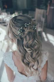 It can be worn by both the brides and guests. Loose Curl Bridal Hairstyle Braid Floral Accessory Wedding Hair Havana Photography Hair Styles Bride Hairstyles Braids For Long Hair