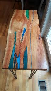 This is a great build to take your woodworking to the next level and i think this would be a great introduction to a number of new woodworking methods. Resin River Live Edge Wood Coffe Table Console Table What You See In The Above Picture Is A Live Edg Resin And Wood Diy Wood Table Design Live Edge Wood Table