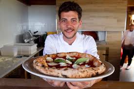 If he wanted to refer to the cow's milk mozzarella he would have said: Sulla Pizza Ci Va Il Fiordilatte E Non La Mozzarella Di Bufala Vero Falso