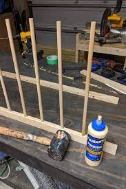 Use some painters tape to create and paint your own design on the rack that will match the rest of your storage area for an outstanding diy drying rack. Diy Fold Down Drying Rack Crafted By The Hunts