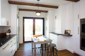 Kitchen islands & carts bathroom carts sometimes the shelves and cabinets just don't seem to be enough for the things we want to have accessible in the kitchen. Black And White Kitchen With Freestanding Stainless Steel Kitchen Island Modern Kitchen