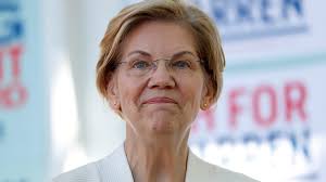 Warren gives mocking gesture while blocking bill protecting female athlete 