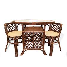 Wicker dining chairs typically have a construction that's only part wicker; Dining Furniture Borneo Set Of 2 Natural Rattan Chairs With Cream Cushion And Oval Table Wicker W Glass Dark Brown Buy Online In Faroe Islands At Faroe Desertcart Com Productid 17366174