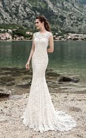 Up next we have a midi gown, perfect for registry office weddings or simply brides who want to show off their shoes! Vintage Lace Wedding Dress Skinny Fashion Dresses