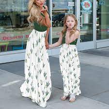 People will naturally ask if you are from the same family and you can respond to them that you are while praising your colored apparel and personality trait. Mother Daughter Dresses Cactus Print Long Dress Mom And Daughter Family Matching Outfits Mommy And Me Clothes Matching Family Outfits Aliexpress