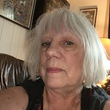 AN ENGROSSING AND SUSPENSEFUL MYSTERY" ~Kirkus Reviews A body found hanging  from the ceiling fan in the tower room of the old manor house