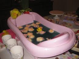 My Punch Bowl Was Too Small So I Improvised The Plastic Baby Tub Held 35 Cups Of Punch Floated The Rubber Duckies Baby Tub Baby Shower Baby Boy Shower