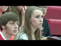 AARON KAMPMAN HUDDLES UP WITH MAQUOKETA FCA