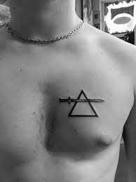 Top 37 Simple Chest Tattoo Ideas 2020 Inspiration Guide Chest Tattoo Men Small Chest Tattoos Tattoos For Guys