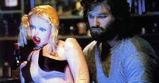 Film Still Of Kurt Russell And His Blowup Doll From The Things 1982