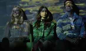 Emily in paris is a 2020 american tv series created by darren star and released by netflix on october 2, 2020. Emily In Paris Creators Say Threesome Hints Were Totally Intentional