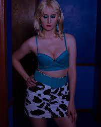 Then there's a wide, blue belt over hot pink leopard leggings. My Cassie Howard Alabama Worley Costume Euphoria True Romance Cosplay