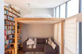 Sliding barn doors separate the master bedroom balcony from the entry and living room inspiration for a medium sized contemporary mezzanine bedroom in seattle with bamboo flooring. Mezzanine Design And Build Loft Stairs Storage New Cross London Scandinavian Loft