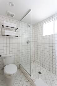 Black And White Tile Powder Room Bathroom Of The Week An Economical Plywood Bath In Tahoe Remodelista White Tiles Black Bathroom White Tiles Black Grout