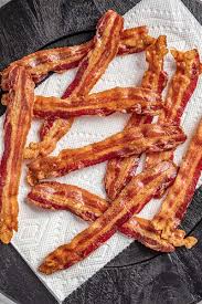 If you want to add bacon pieces to a recipe it's easier to cook the bacon first, allow it to cool a little and then snip into pieces using kitchen scissors. How To Cook Bacon In The Oven