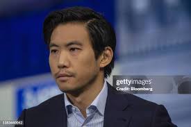 Eric Liu, chief executive officer of Vanda Research Corp., listens... News  Photo