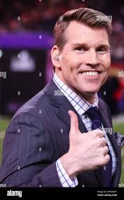 NFL RedZone host Scott Hanson is seen with Sirius XM NFL Radio host Mark  Dominik