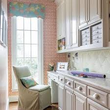 For an elegant craft room, consider reworking an old dining room hutch or china cabinet into a craft supply storage unit. Craft Room Built In Cabinets Design Ideas