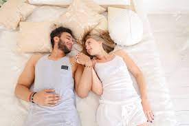 With tenor, maker of gif keyboard, add popular caress love animated gifs to your conversations. Young And Beautiful Couple Loving Each Other Lie On Soft Bed Stock Photo Picture And Royalty Free Image Image 73260778
